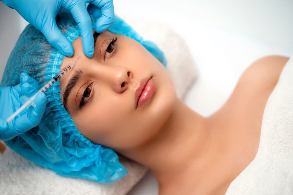 Cosmetologist Doing a Rejuvenating Facial Injections Procedure