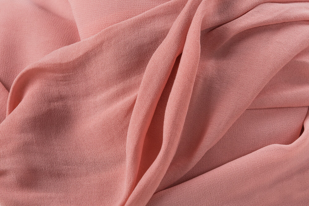 Soft Pink Fabric Shaped as Female Genital Organs
